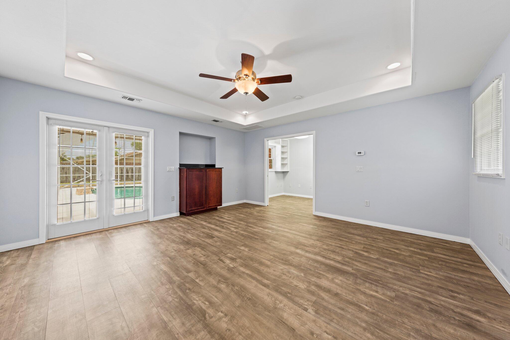20 Maple Avenue Shalimar, FL 32579 - Photo 22 of 55 a view of empty room with wooden floor and fan