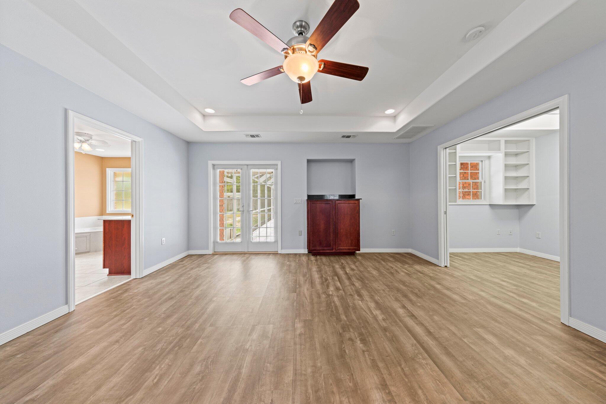 20 Maple Avenue Shalimar, FL 32579 - Photo 23 of 55 a view of an empty room with window and wooden floor
