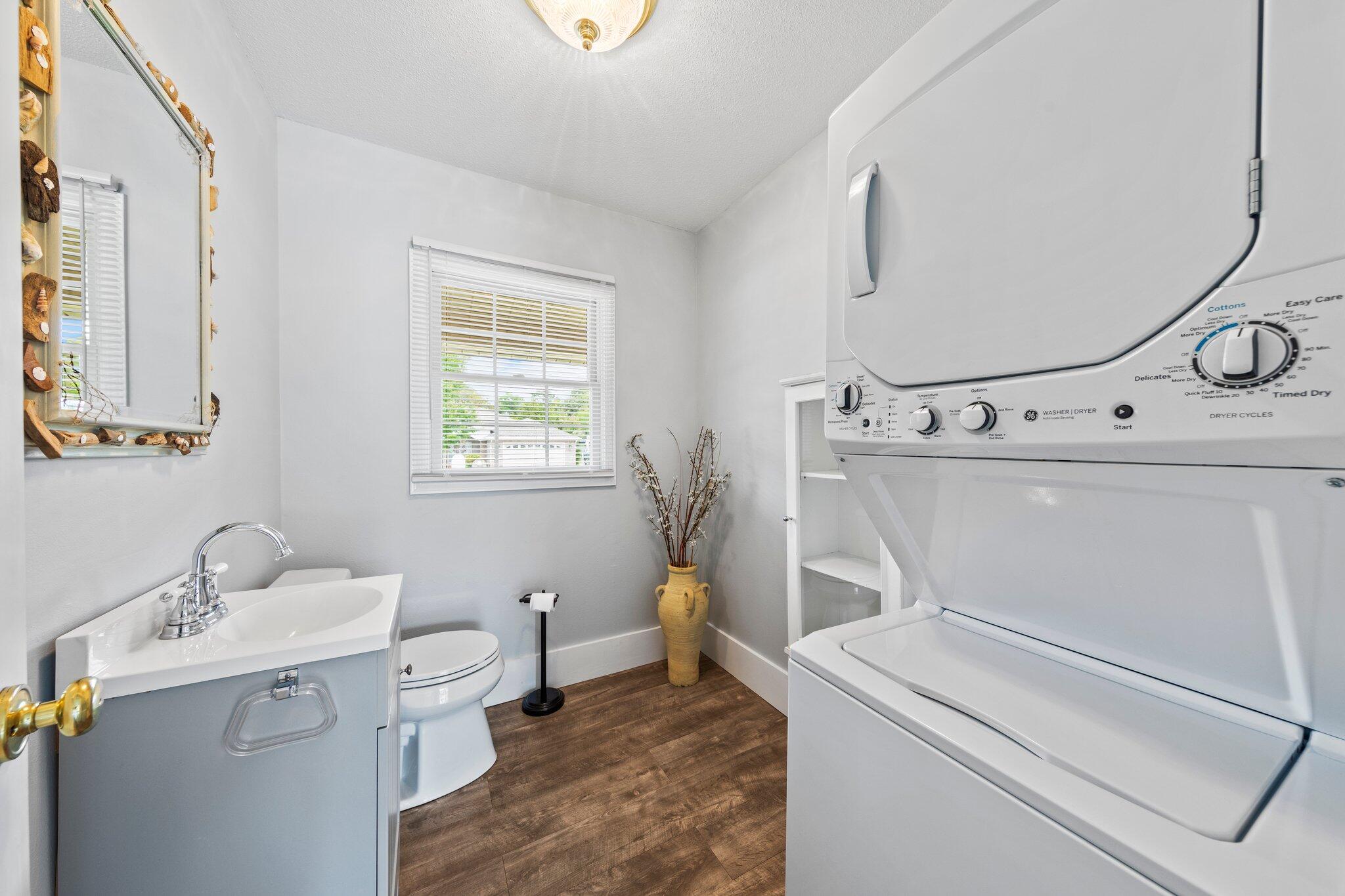 20 Maple Avenue Shalimar, FL 32579 - Photo 28 of 55 a utility room with dryer and washer