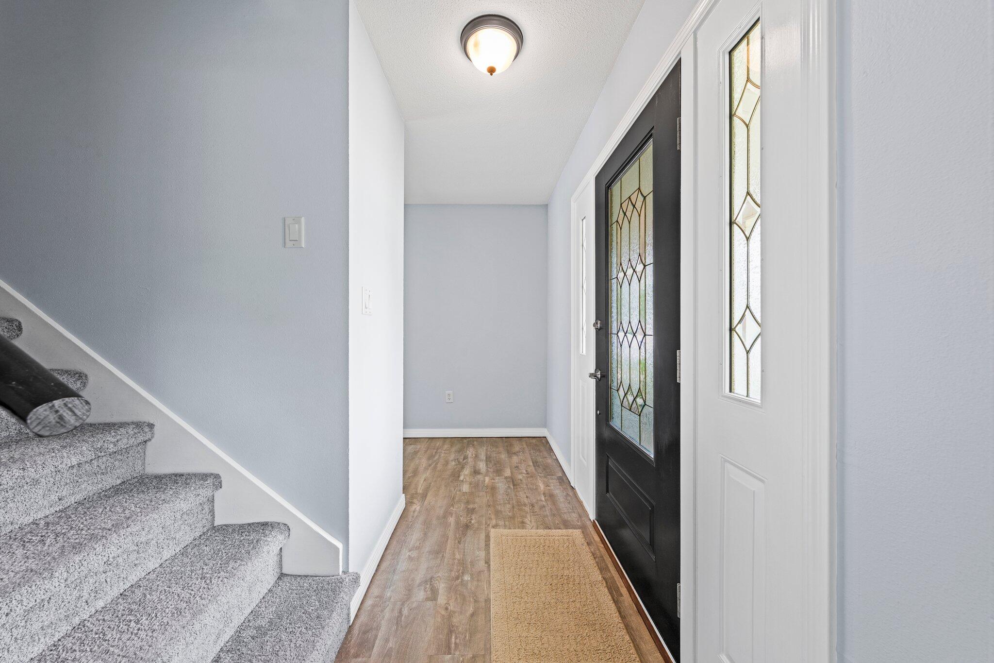 20 Maple Avenue Shalimar, FL 32579 - Photo 32 of 55 a view of a hallway with wooden floor and staircase