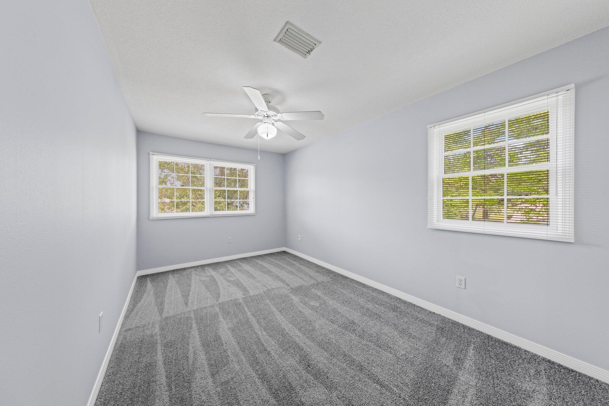 20 Maple Avenue Shalimar, FL 32579 - Photo 40 of 55 an empty room with windows