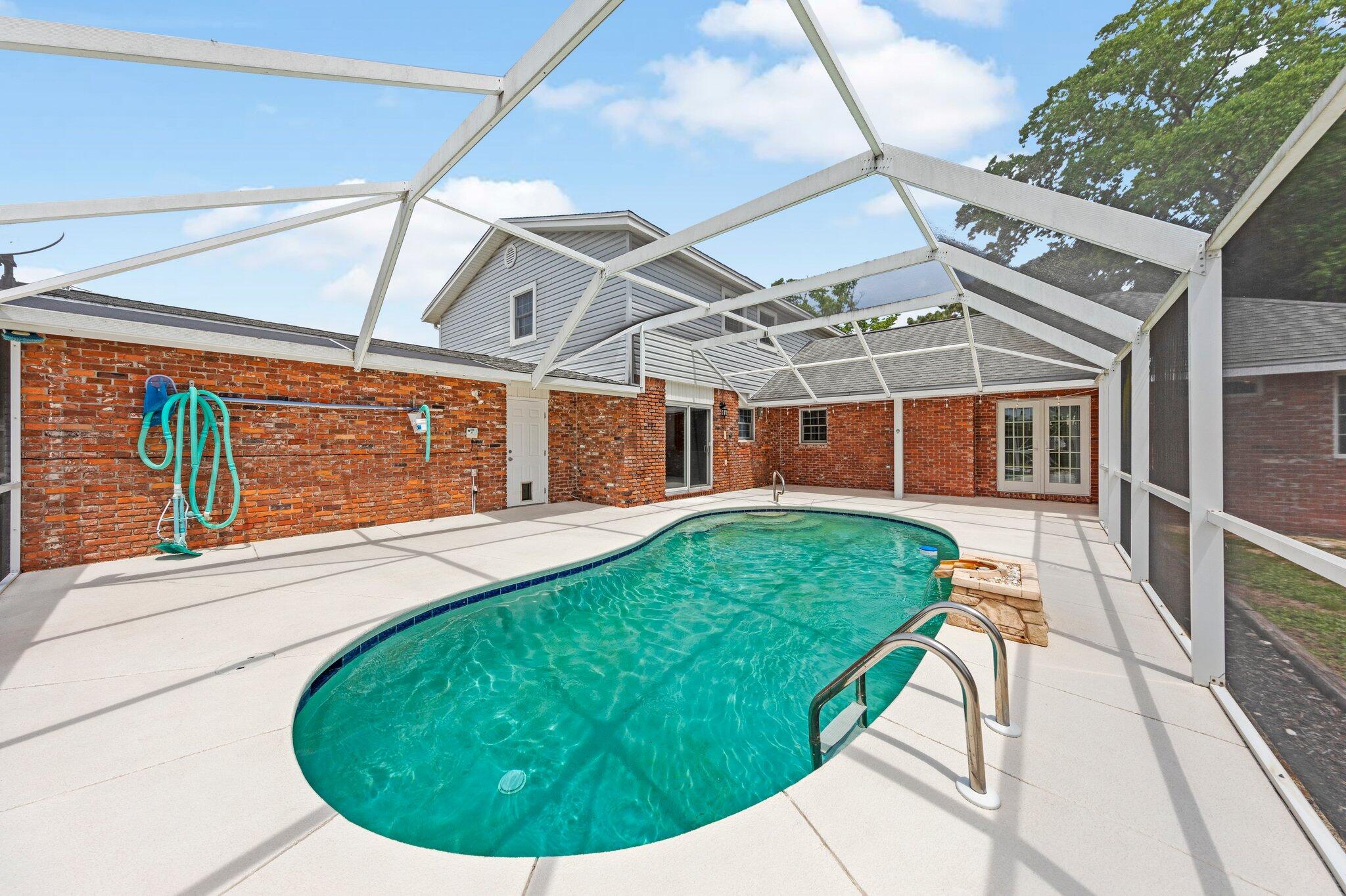 20 Maple Avenue Shalimar, FL 32579 - Photo 4 of 55 a view of a house with a backyard