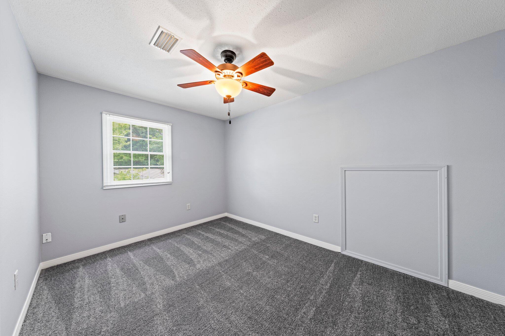 20 Maple Avenue Shalimar, FL 32579 - Photo 42 of 55 a view of an empty room with a window