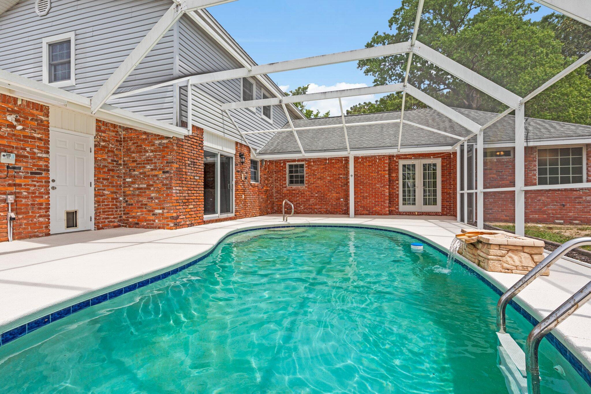20 Maple Avenue Shalimar, FL 32579 - Photo 49 of 55 a view of a house with a backyard
