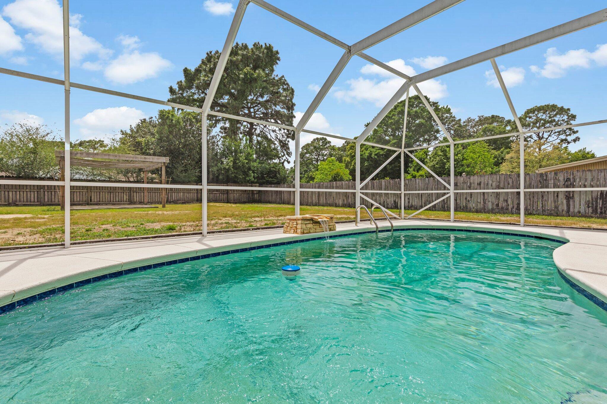 20 Maple Avenue Shalimar, FL 32579 - Photo 50 of 55 a view of a swimming pool with a backyard