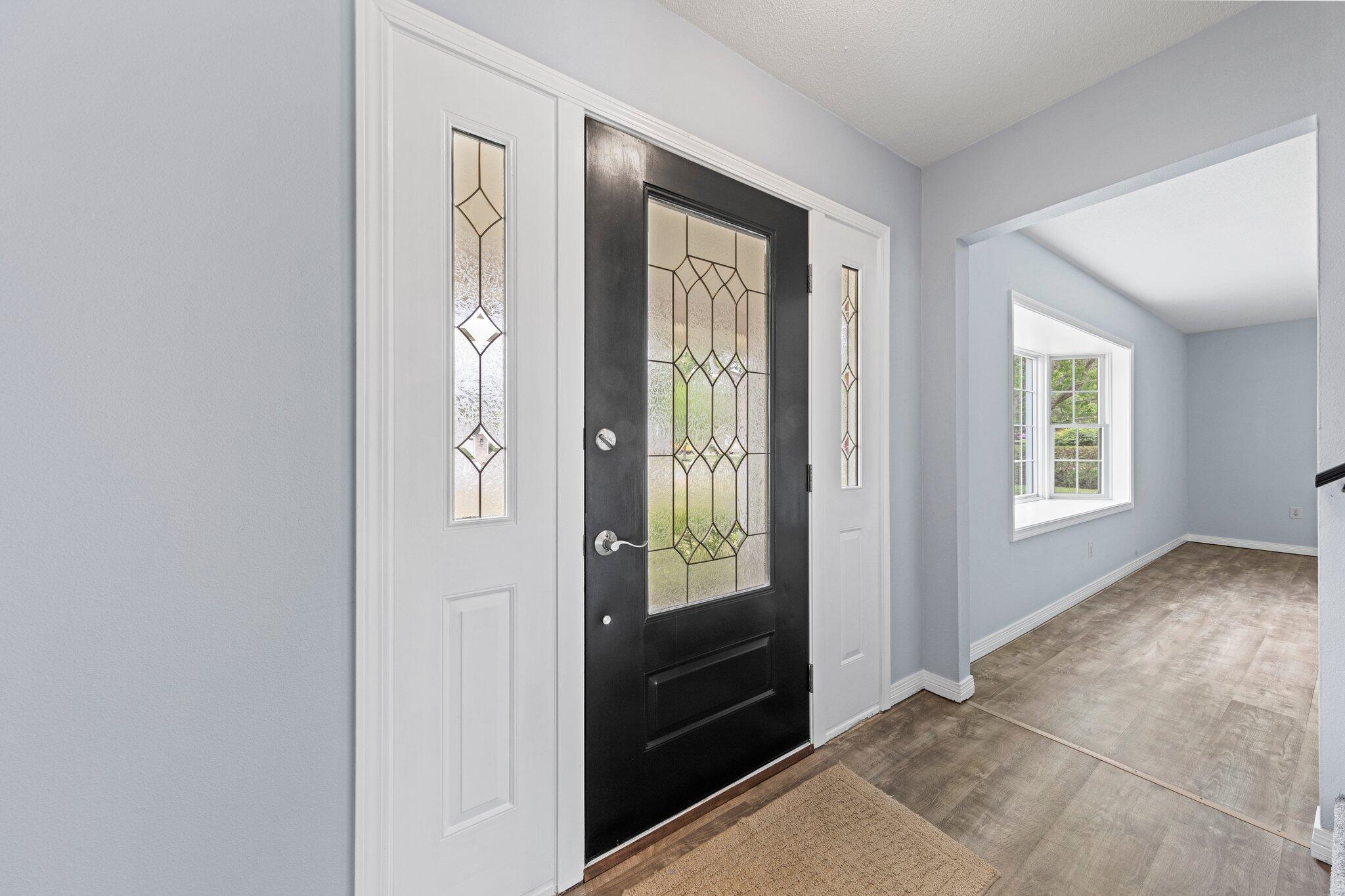 20 Maple Avenue Shalimar, FL 32579 - Photo 5 of 55 a view of an entryway with wooden floor