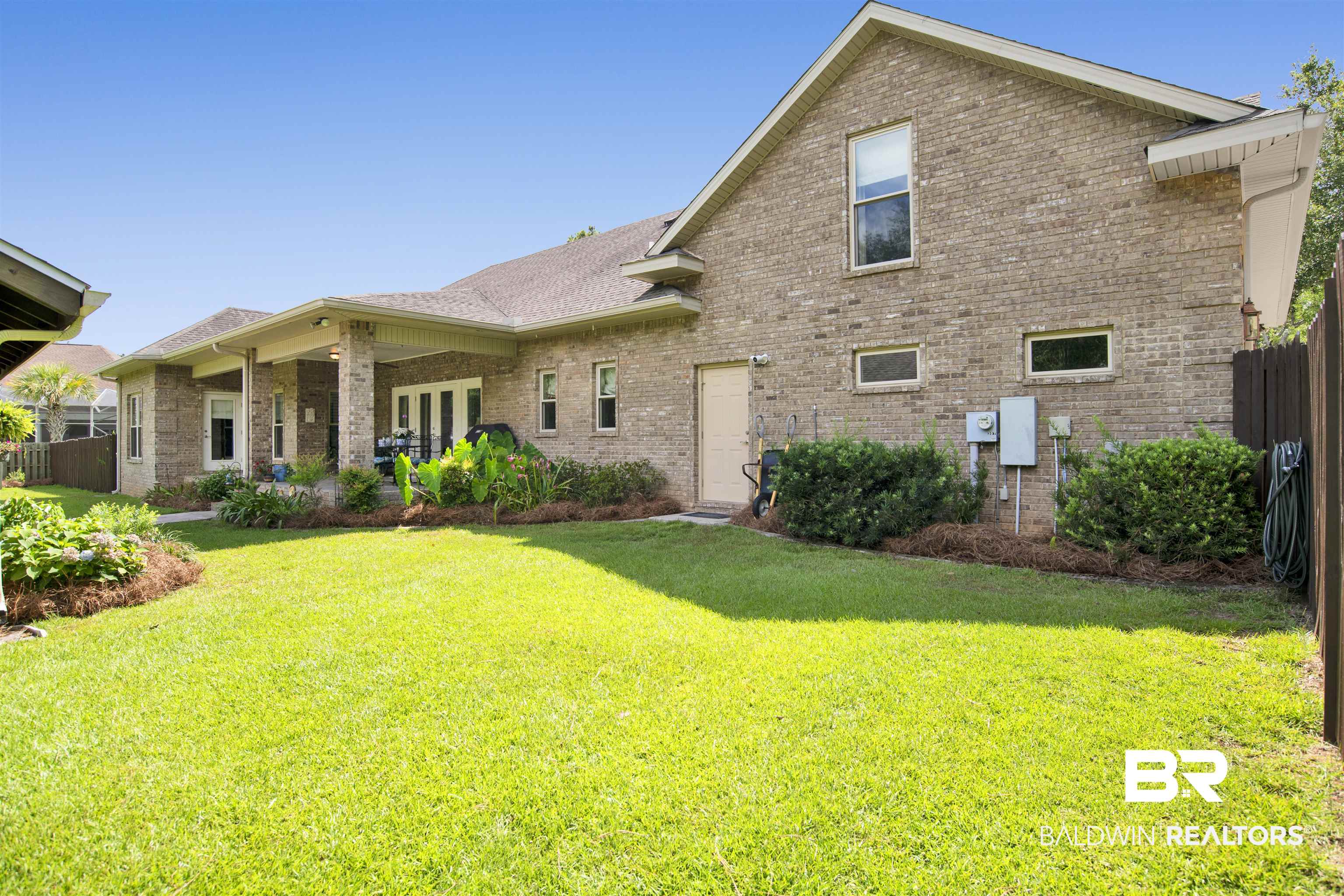 8358 Forest Lane Foley, AL 36535 - Photo 11 of 46 Back of property featuring brick siding and french doors