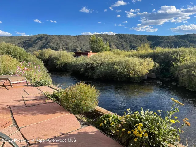 a view of a lake with a mountain in the background