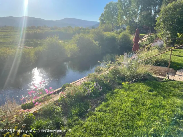 a view of lake with mountain