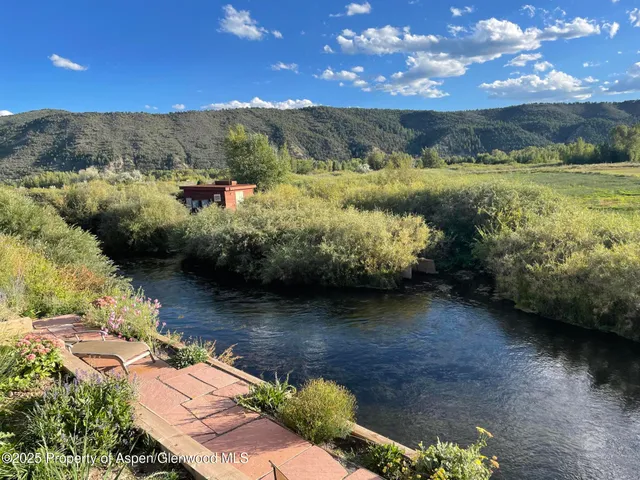 a view of lake with mountain