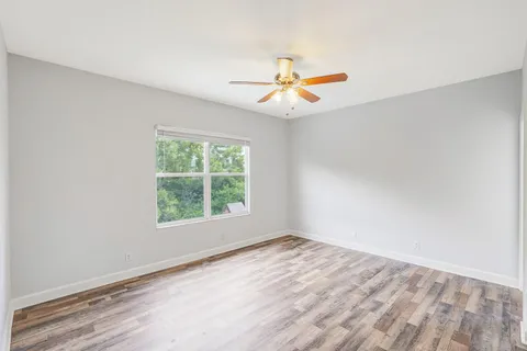 a kitchen with stainless steel appliances granite countertop a sink stove and microwave