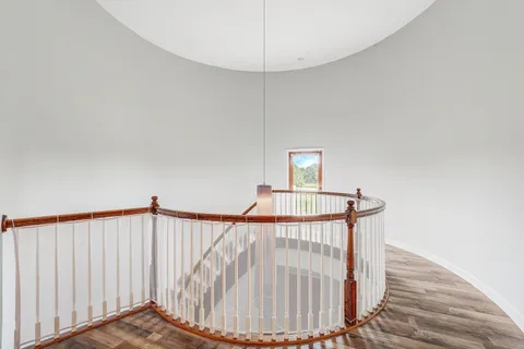 a park with trees in front of it