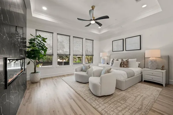 a bed room with furniture and a window