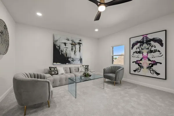 a living room with furniture and a couch