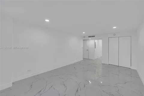 an empty room with an entryway