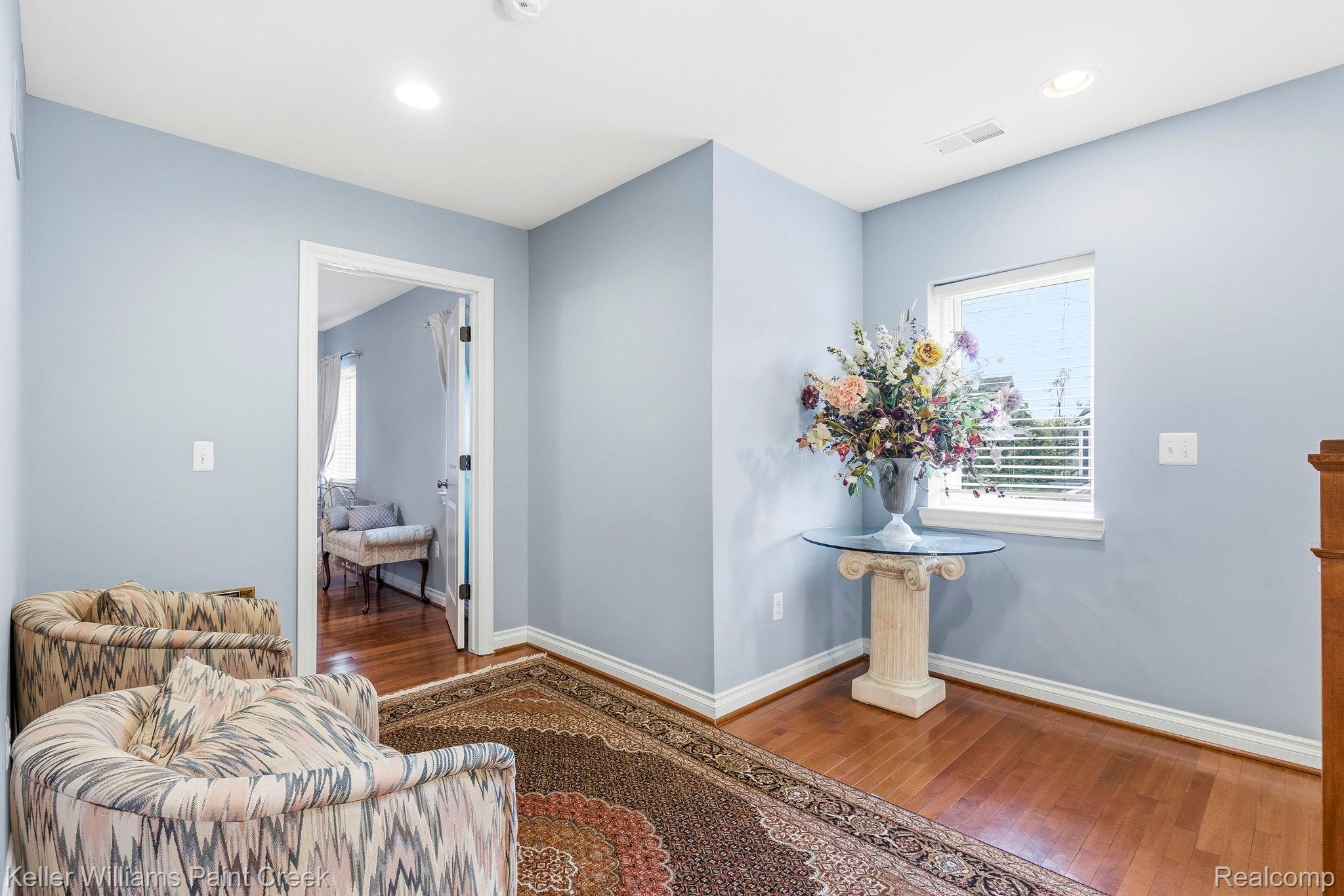 418 Oak Street Rochester, MI 48307 - Photo 26 of 38 Sitting room with hardwood / wood-style floors and recessed lighting