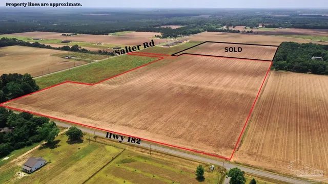 an outdoor space with swimming pool and mountain view