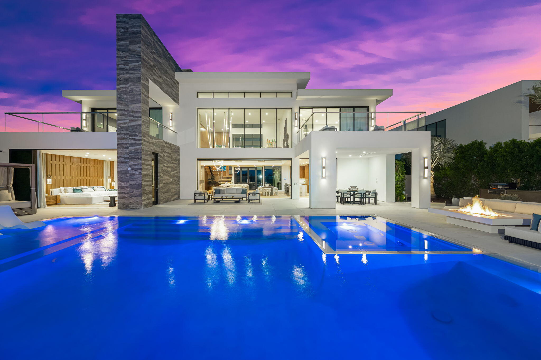 a view of pool with seating area