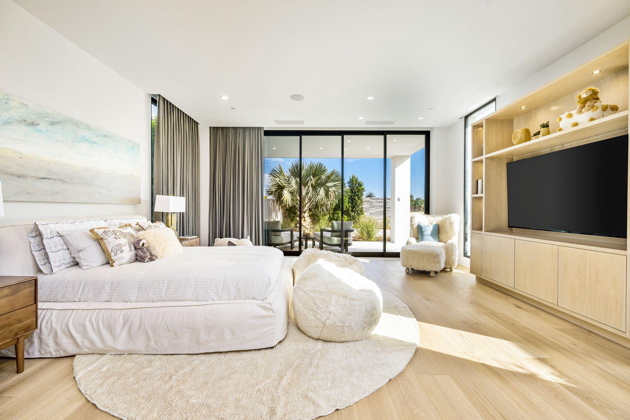 53675 Pike Place La Quinta, CA 92253 - Photo 7 of 12 a large bedroom with a large bed and a flat screen tv