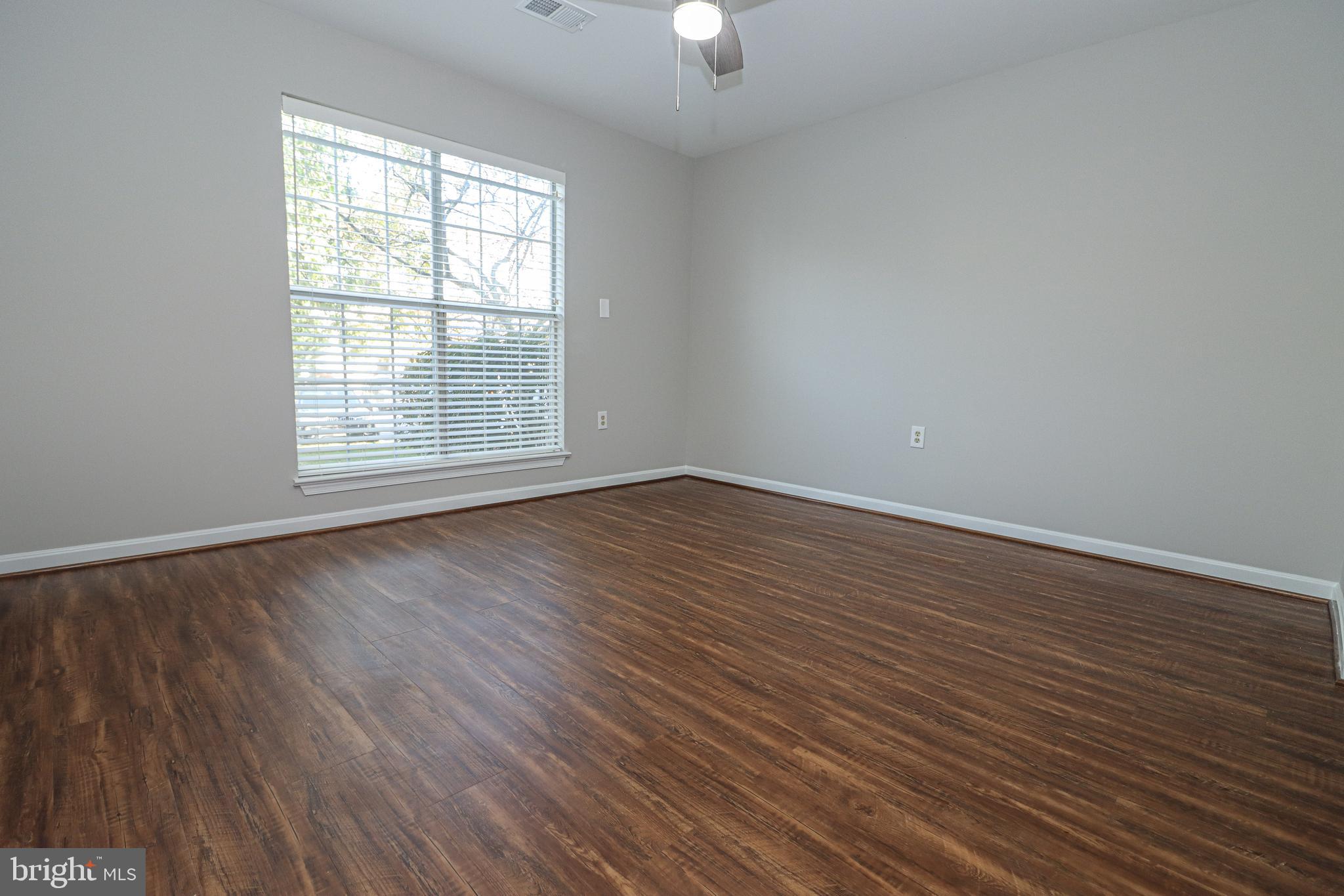 21012 Timber Ridge Terrace, Unit 102 Ashburn, VA 20147 - Photo 14 of 27 Freshly Painted Walls in Bedroom