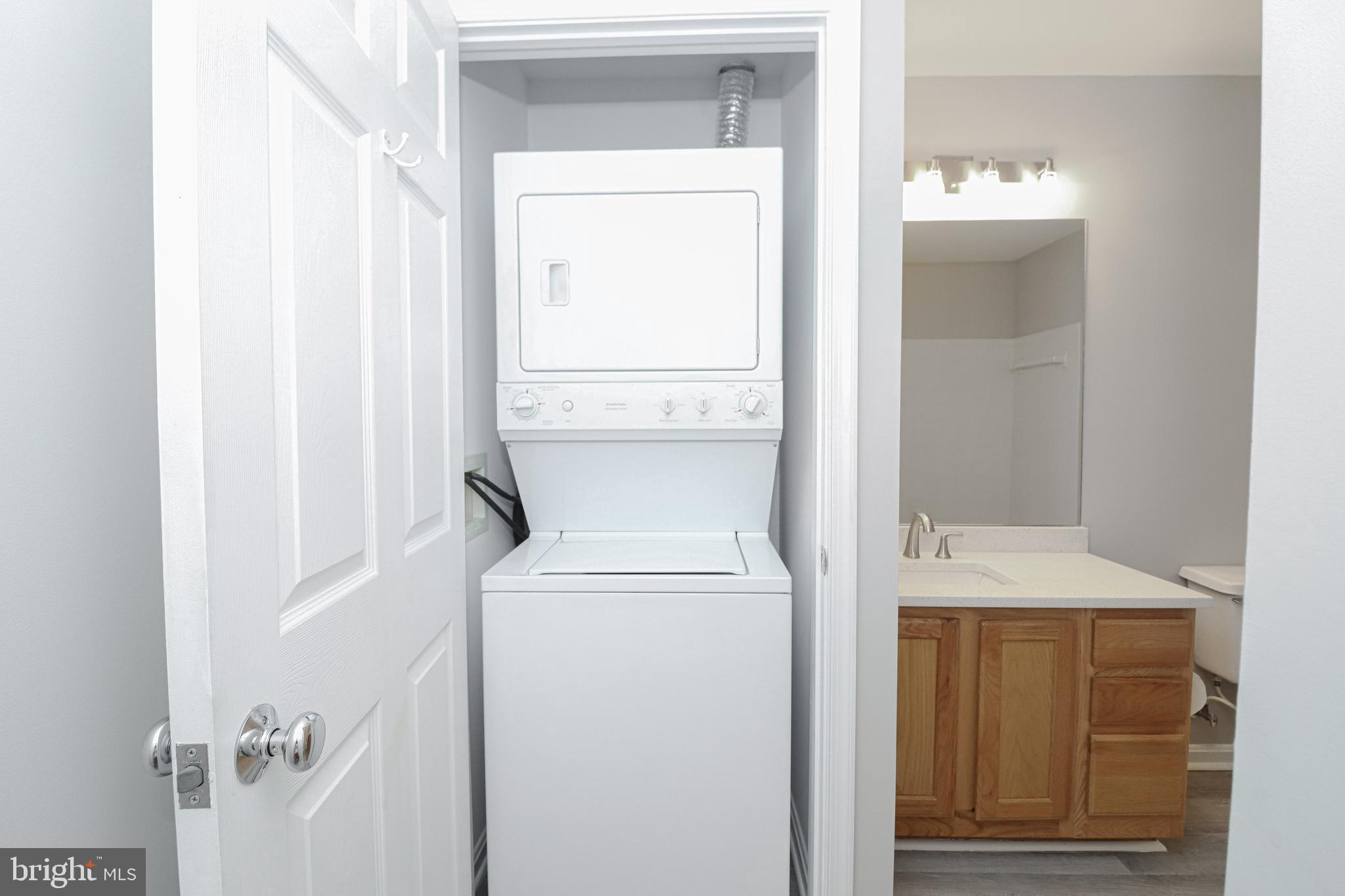 21012 Timber Ridge Terrace, Unit 102 Ashburn, VA 20147 - Photo 22 of 27 Washer and Dryer in Unit
