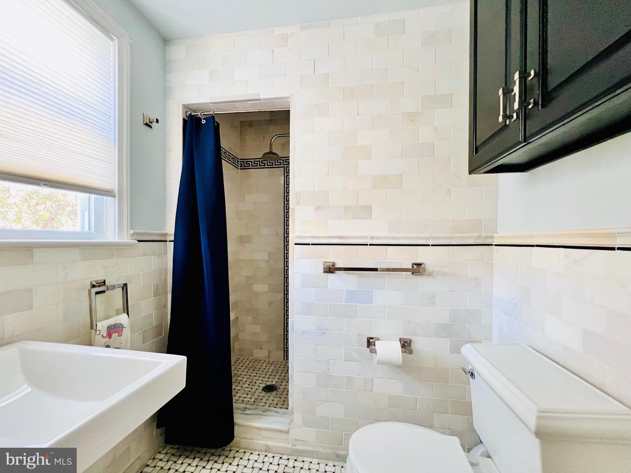 5015 Fulton Street Northwest Washington, DC 20016 - Photo 6 of 8 Bathroom main level