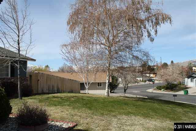 3985 Belmore Way Reno, NV 89503 - Photo 2 of 13 a backyard of a house with lots of green space