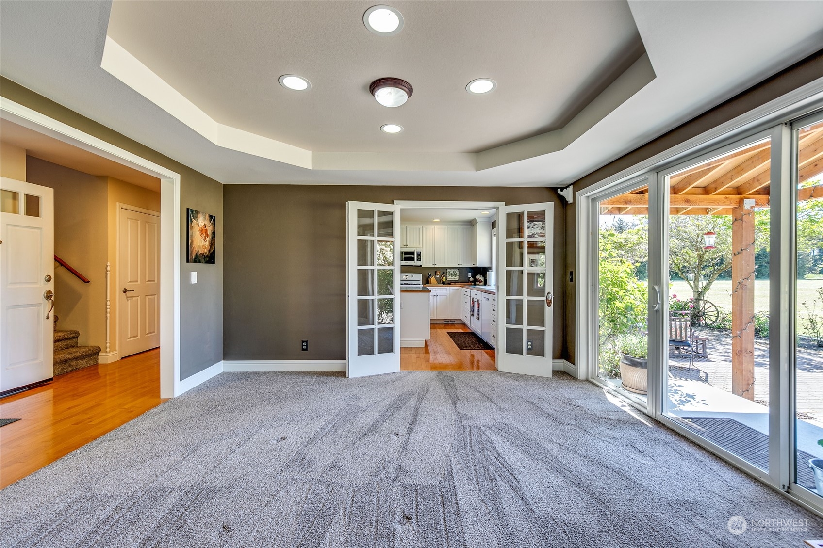 174 Lot 9&10 Knutsen Farm Road Sequim, WA 98382 - Photo 13 of 40 a view of a livingroom with wooden furniture and a ceiling fan