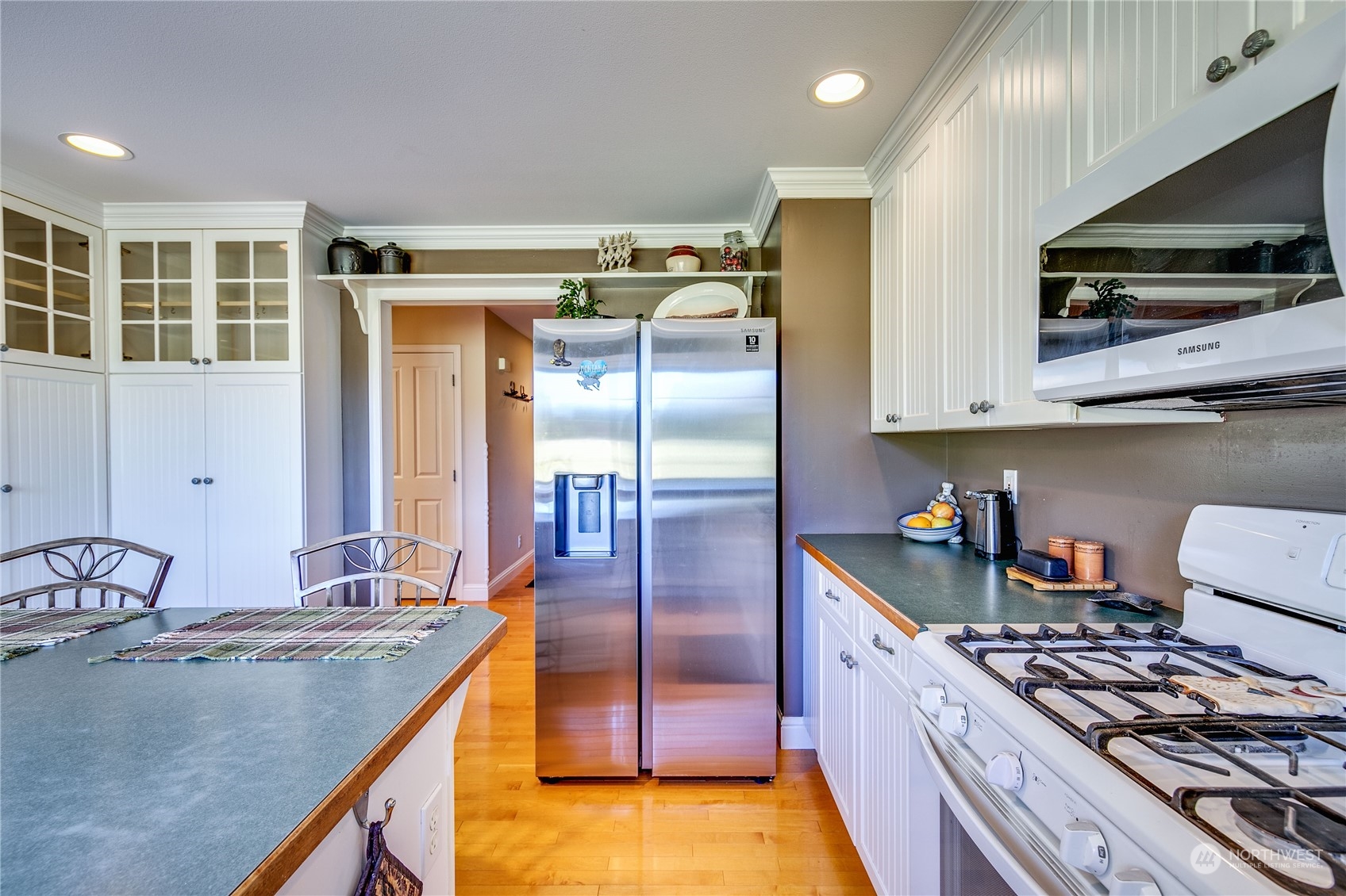 174 Lot 9&10 Knutsen Farm Road Sequim, WA 98382 - Photo 19 of 40 a kitchen with stainless steel appliances granite countertop a sink and a stove