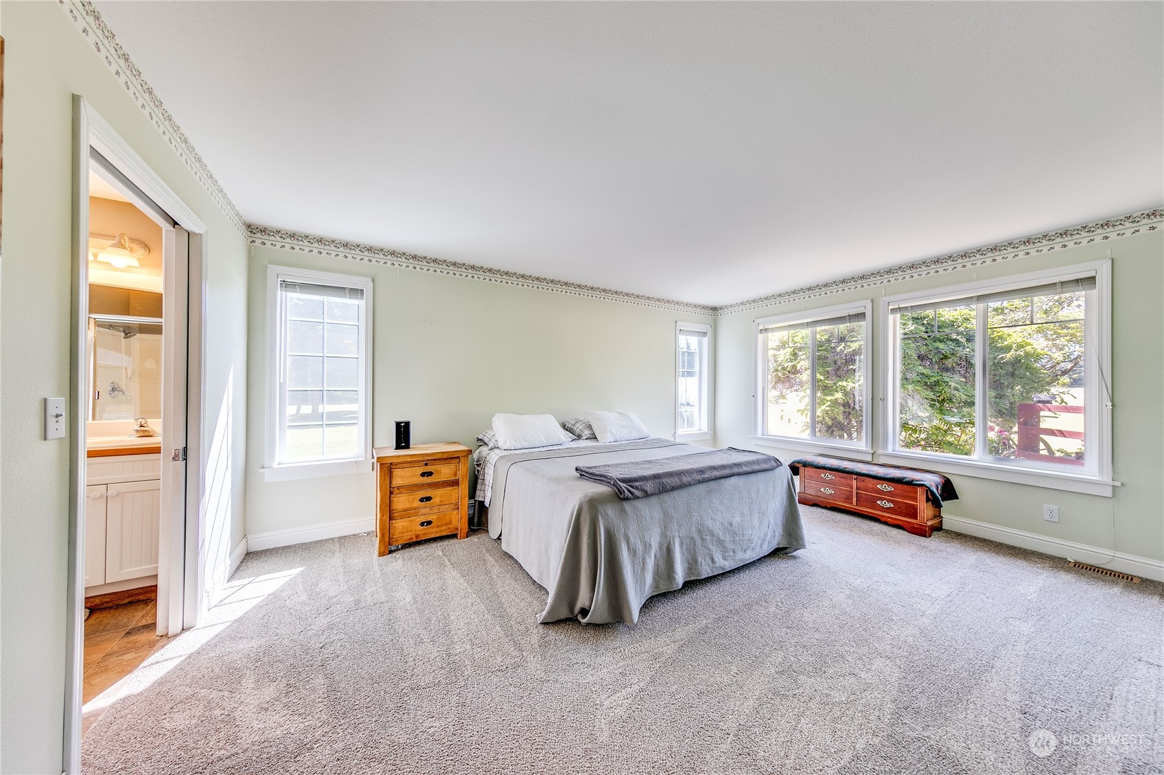 174 Lot 9&10 Knutsen Farm Road Sequim, WA 98382 - Photo 21 of 40 a spacious bedroom with a bed and wooden floor