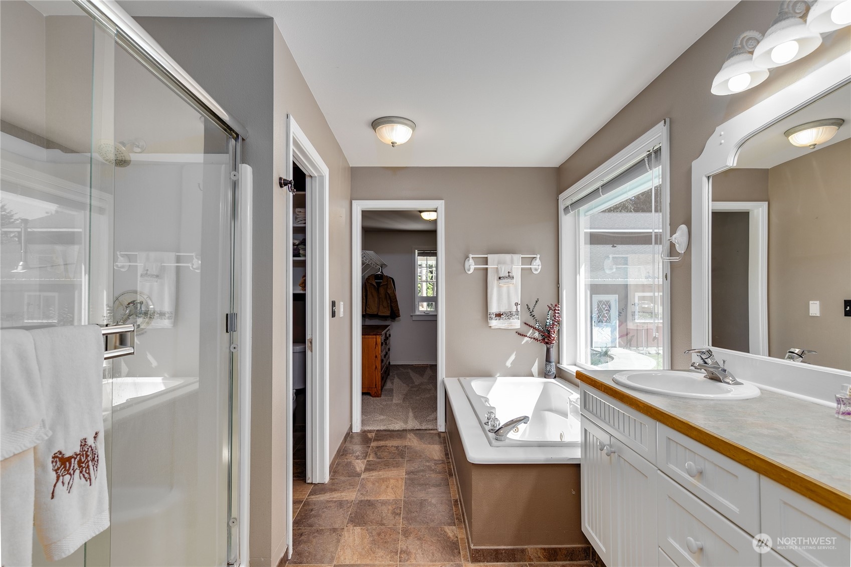 174 Lot 9&10 Knutsen Farm Road Sequim, WA 98382 - Photo 22 of 40 a bathroom with a granite countertop sink mirror and bathtub