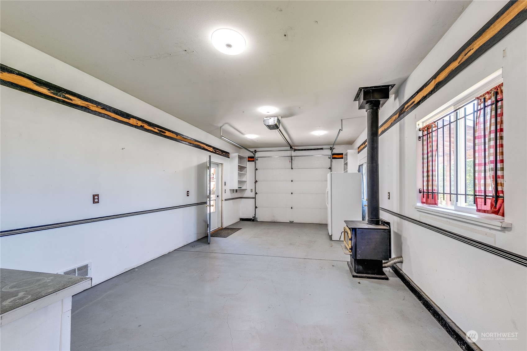 174 Lot 9&10 Knutsen Farm Road Sequim, WA 98382 - Photo 39 of 40 a view of a livingroom with furniture and a window