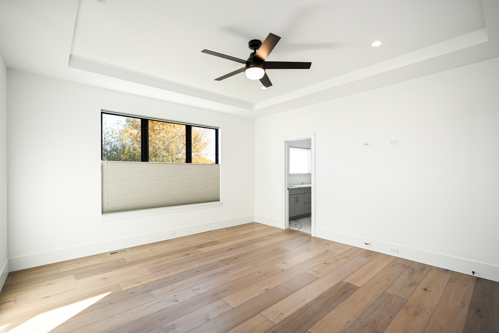 62 Miller Road Lake Zurich, IL 60047 - Photo 27 of 48 a view of empty room with wooden floor and fan