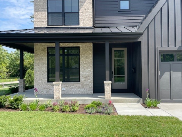 62 Miller Road Lake Zurich, IL 60047 - Photo 7 of 48 a front view of a house with garden