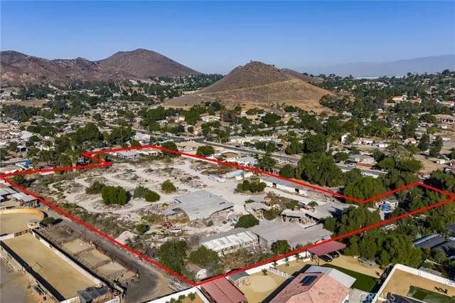 an aerial view of residential houses and city street