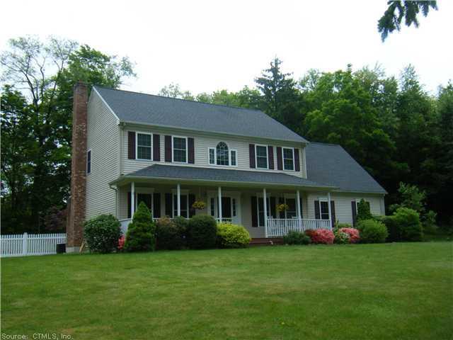 8 Stage Coach Road Durham, CT 06422 - Photo 1 of 1 a front view of a house with a garden