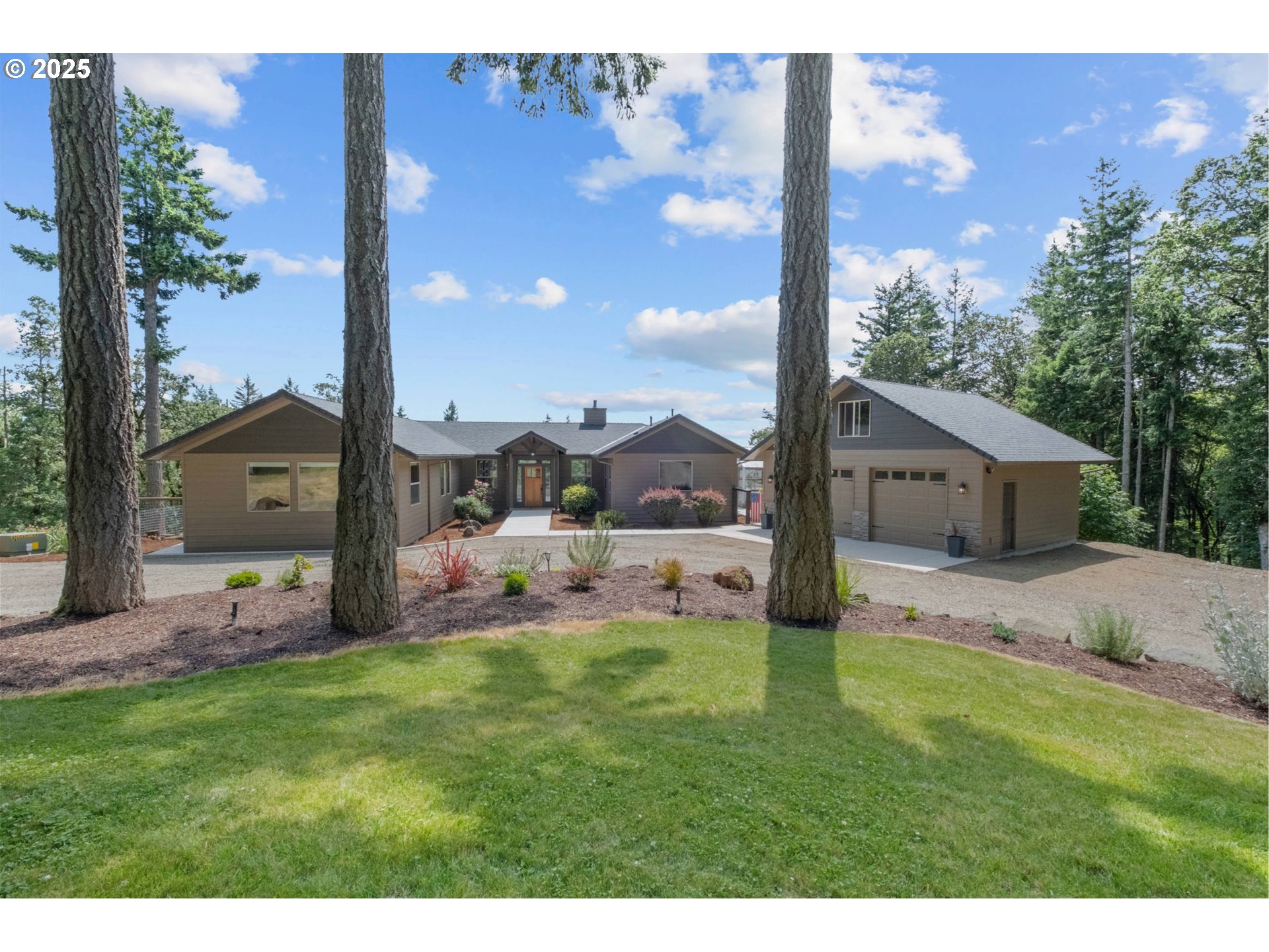24911 Gap Road Brownsville, OR 97327 - Photo 1 of 44 a view of a house with a yard and sitting area