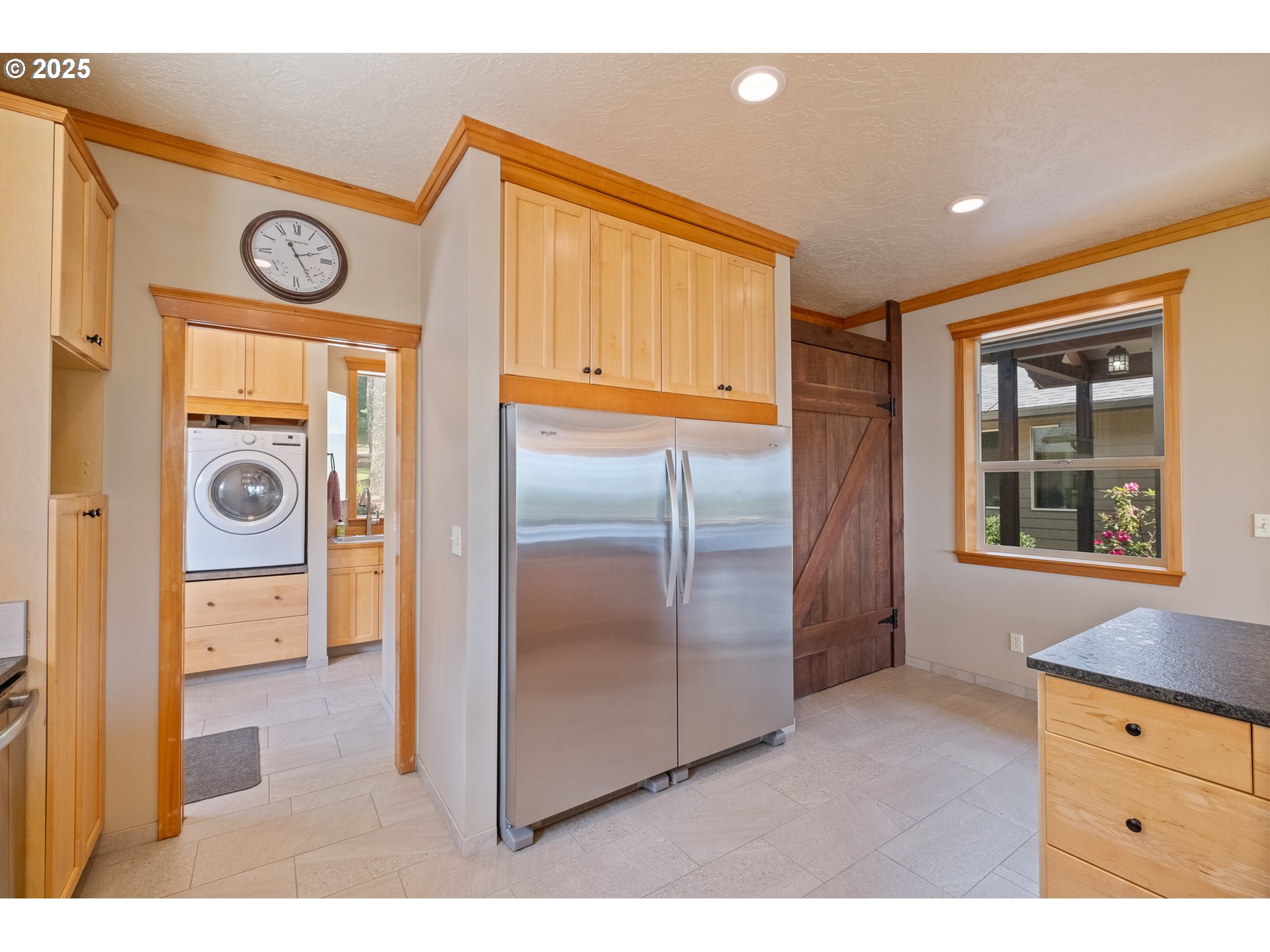 24911 Gap Road Brownsville, OR 97327 - Photo 13 of 44 a kitchen with a refrigerator and a stove top oven