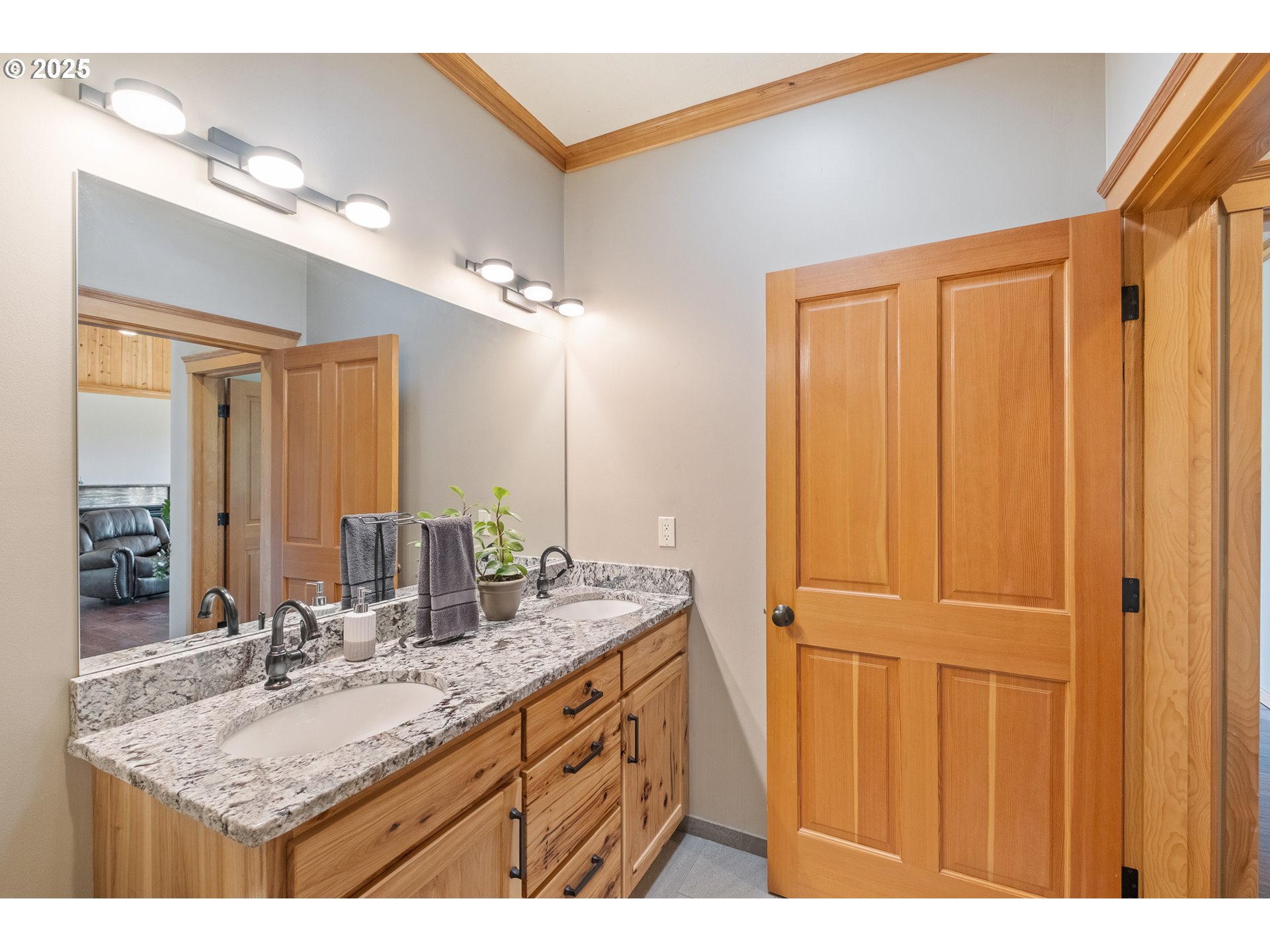 24911 Gap Road Brownsville, OR 97327 - Photo 20 of 44 a bathroom with a granite countertop sink and a mirror
