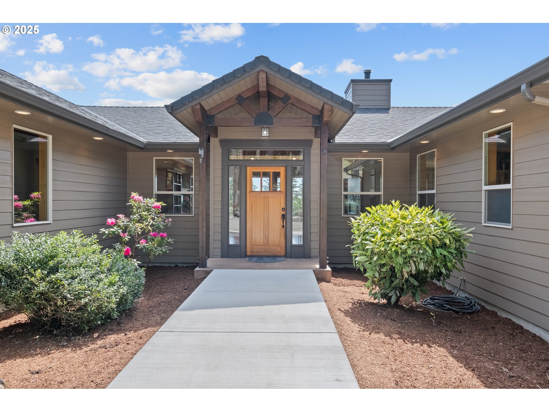 24911 Gap Road Brownsville, OR 97327 - Photo 2 of 44 a front view of a house with a entryway