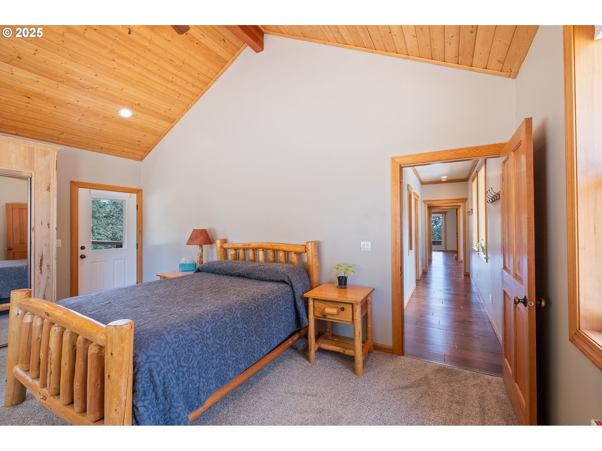 24911 Gap Road Brownsville, OR 97327 - Photo 22 of 44 a bedroom with a bed and a table