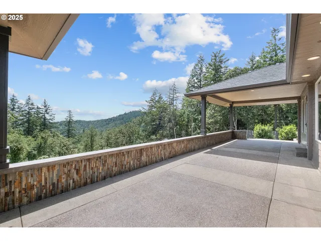 a view of a balcony with an outdoor space