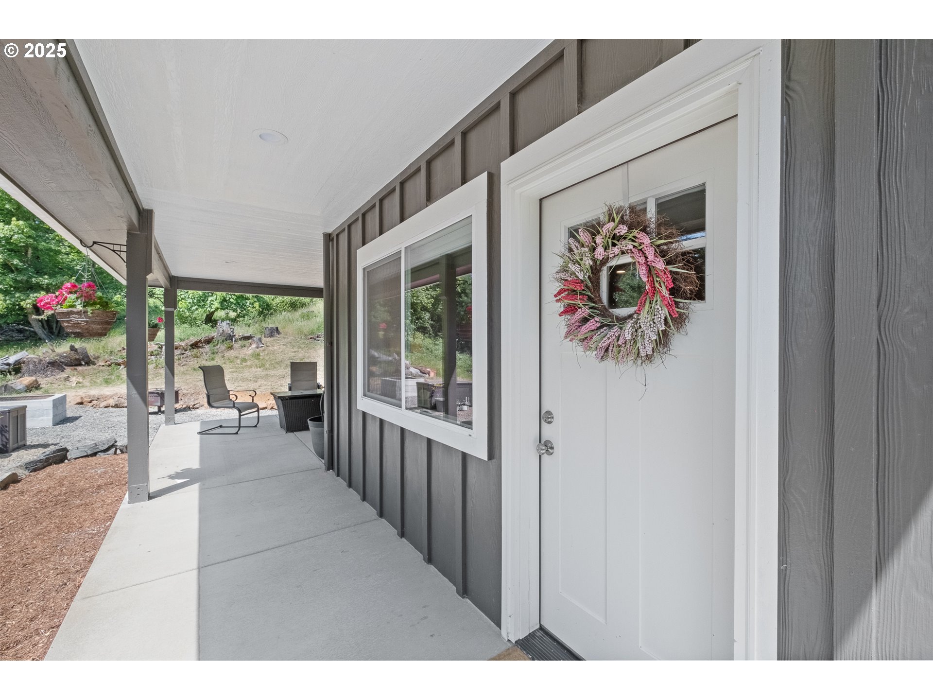 24911 Gap Road Brownsville, OR 97327 - Photo 29 of 44 a view interior of a house with wooden floor and outdoor space