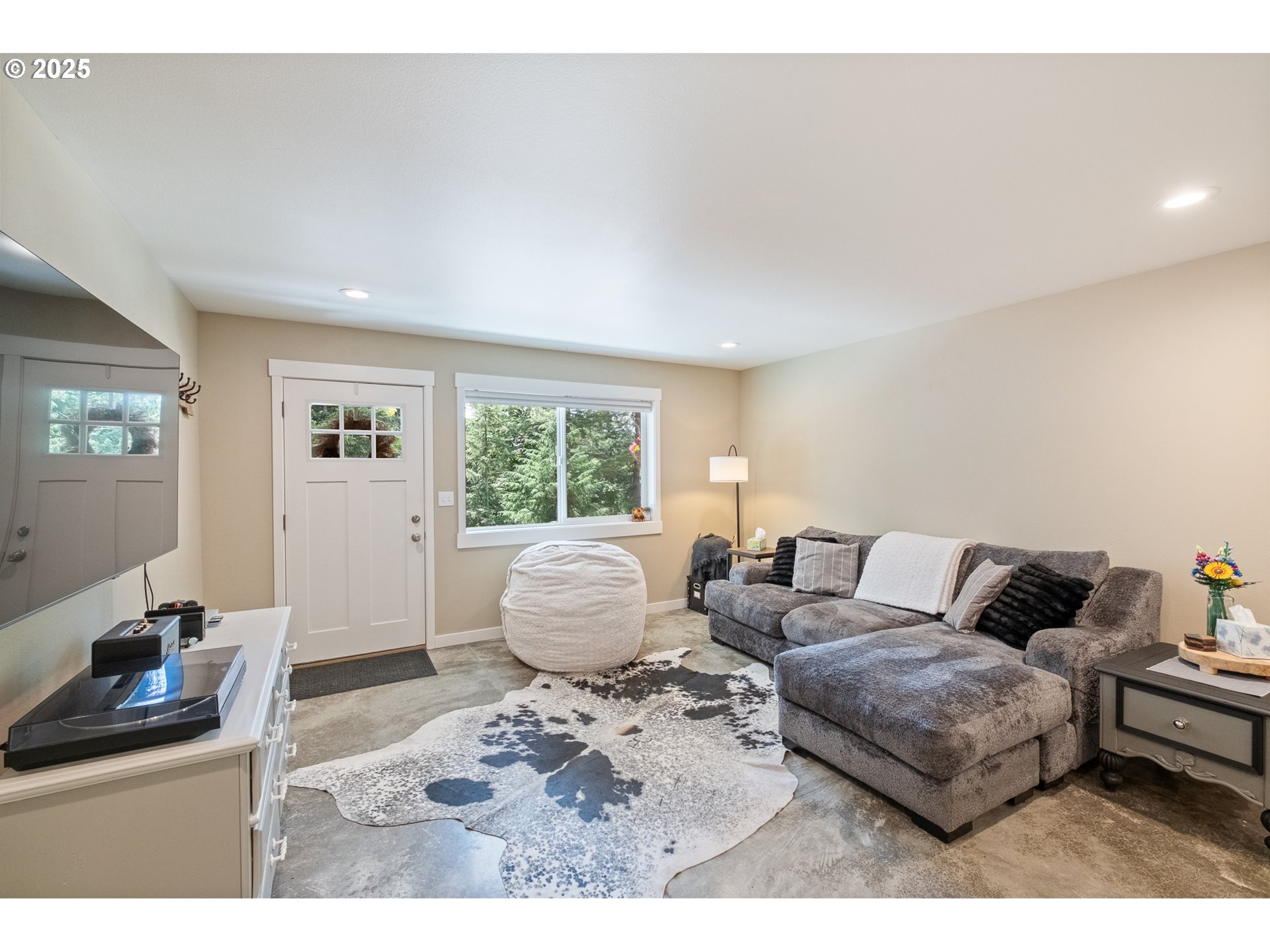 24911 Gap Road Brownsville, OR 97327 - Photo 30 of 44 a living room with furniture and a large window