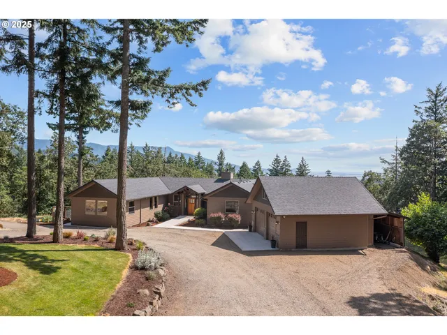 a view of a house with a big yard