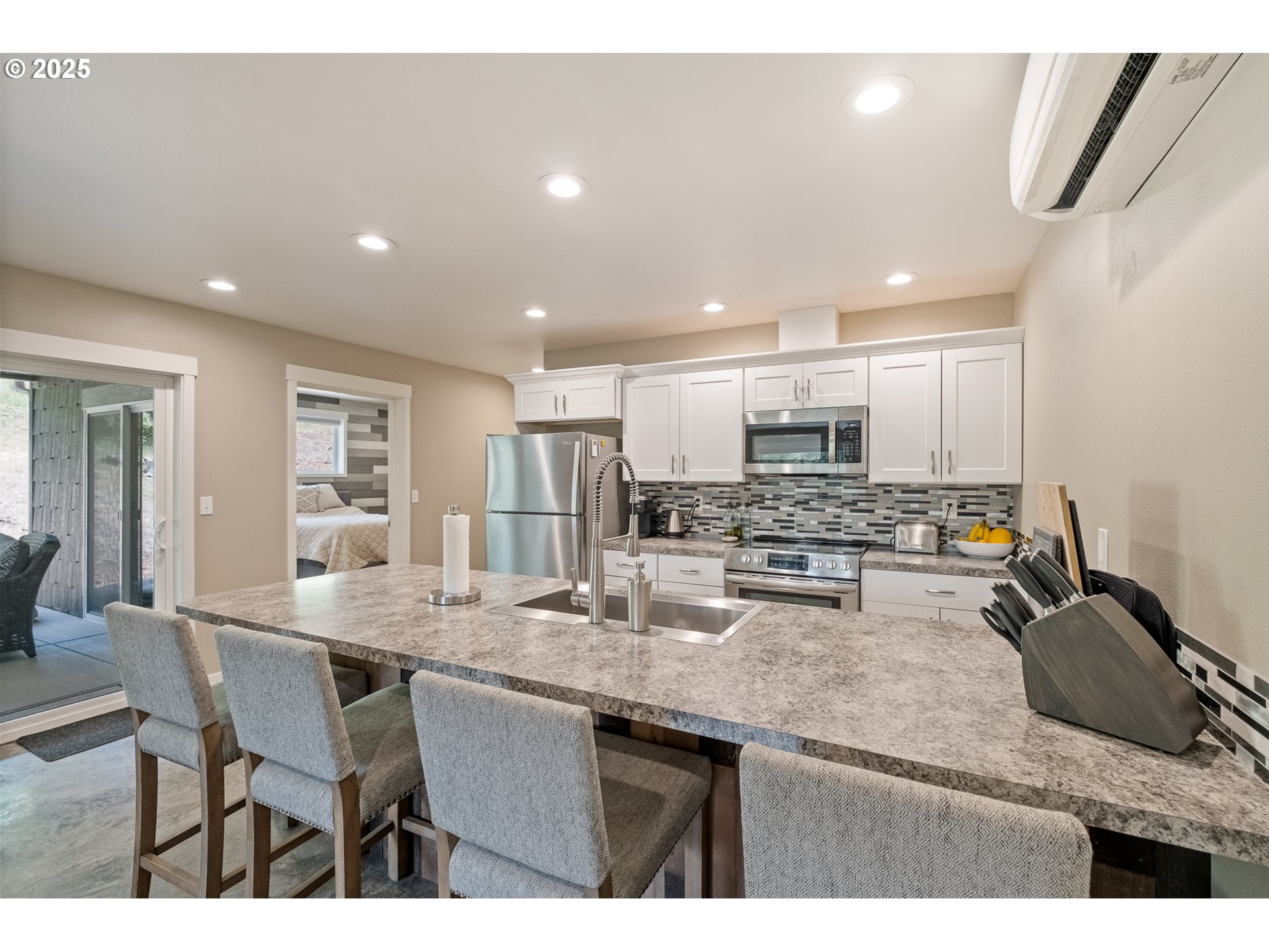24911 Gap Road Brownsville, OR 97327 - Photo 32 of 44 a kitchen with stainless steel appliances granite countertop a sink refrigerator and cabinets