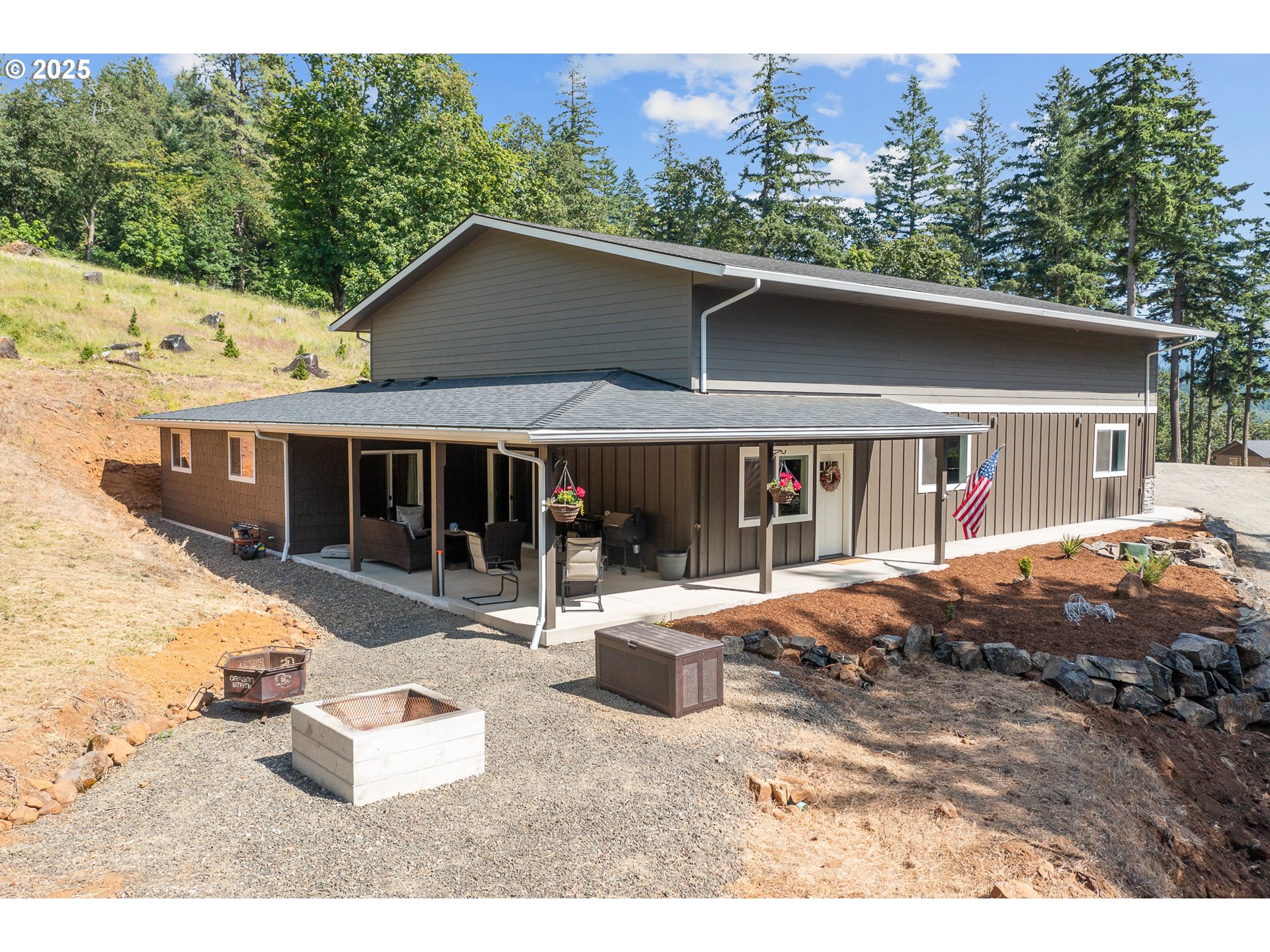 24911 Gap Road Brownsville, OR 97327 - Photo 40 of 44 a view of a house with a patio