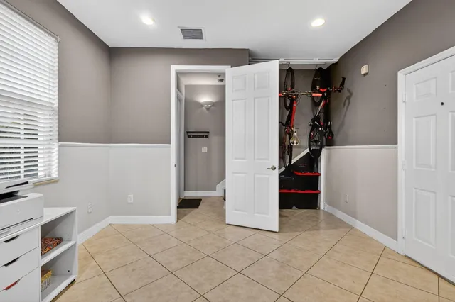a view of a swimming pool and lounge chair