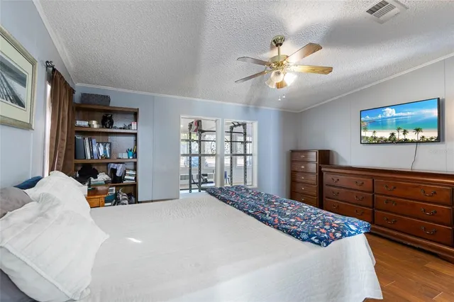 a bedroom with a bed furniture and a window