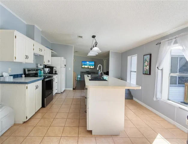 a kitchen with a cabinets and counter